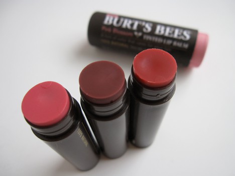 burts bees lip balms with lids off