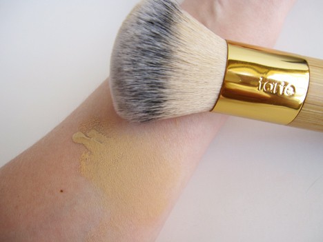 the Amazonian Clay Full Coverage Foundation swatch with brush