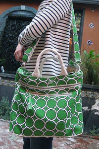 A person carrying a Saltbox - the Geo Carryall 