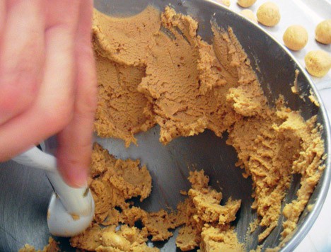 scooping a mixture into a ball