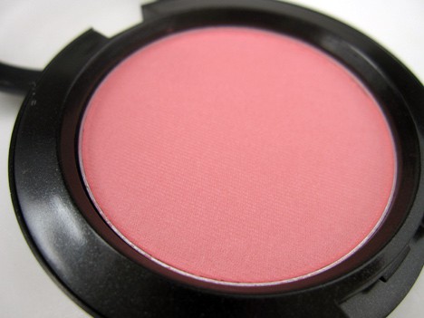Lovecloud with a mid-tone pink shade and a hint of coral, shimmery satin finish