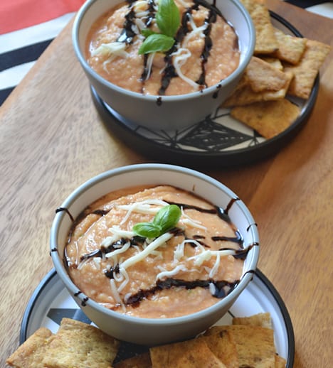 Hummus drizzled with Balsamic vinegar served with pita chips