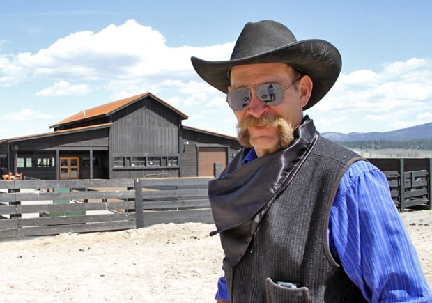 Handsome cowboy in sunglasses