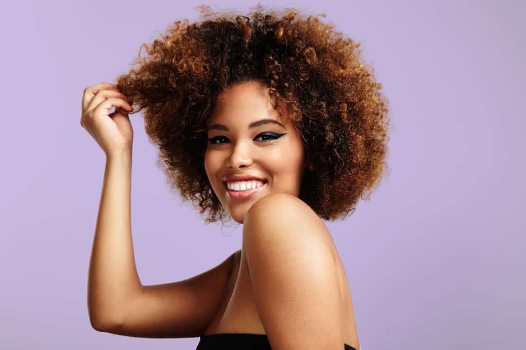 African American gorgeous woman with curly hair