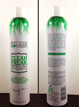 Not your mother's clean freak hairspray on a white wall background