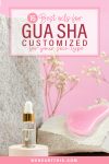 An infographic featuring the text 16 best oils for gua sha customized for your skin type with a small bottle of oil, stone, and gua sha on the background