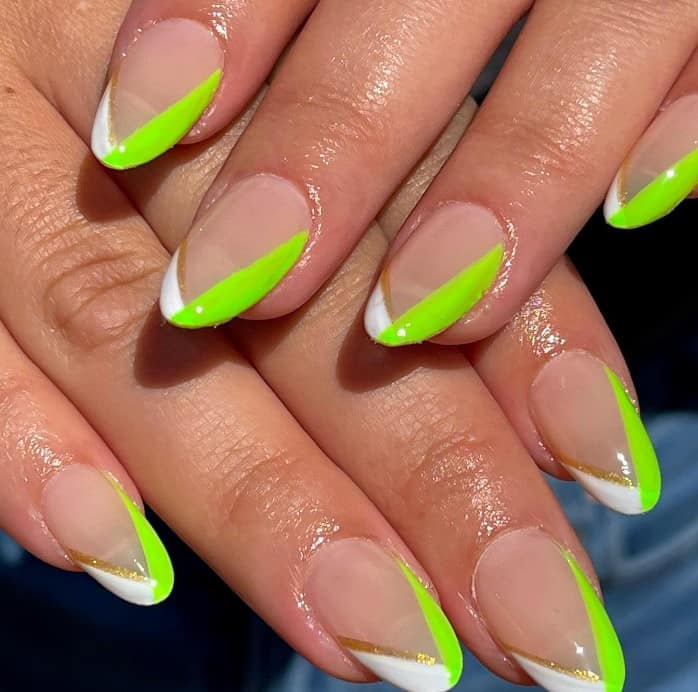A woman's nails with lime green and white V-French tip nails