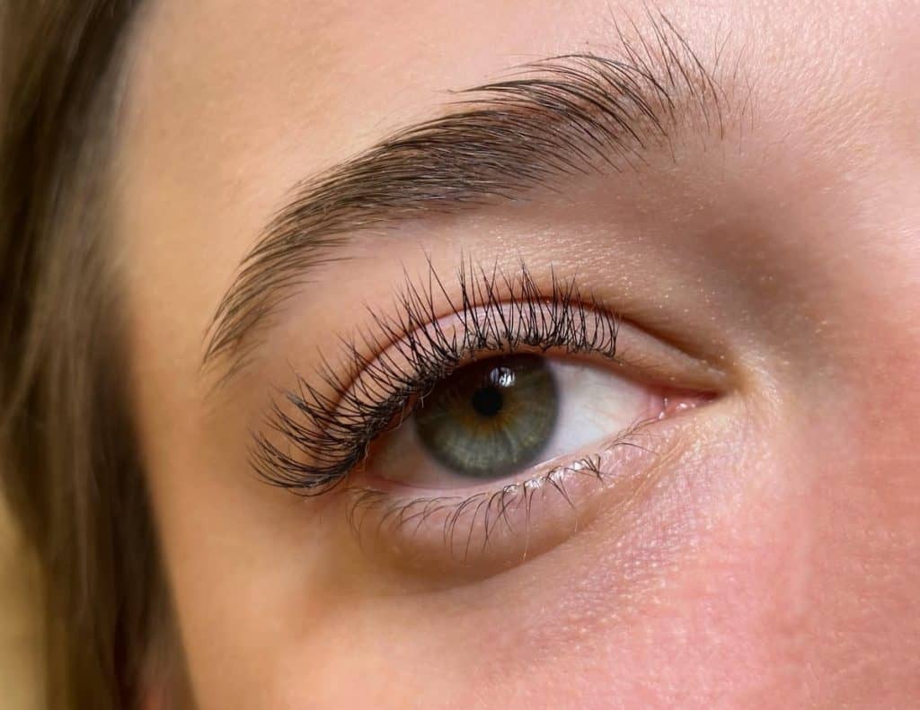 close up photo of a woman with natural-looking eyelash extension