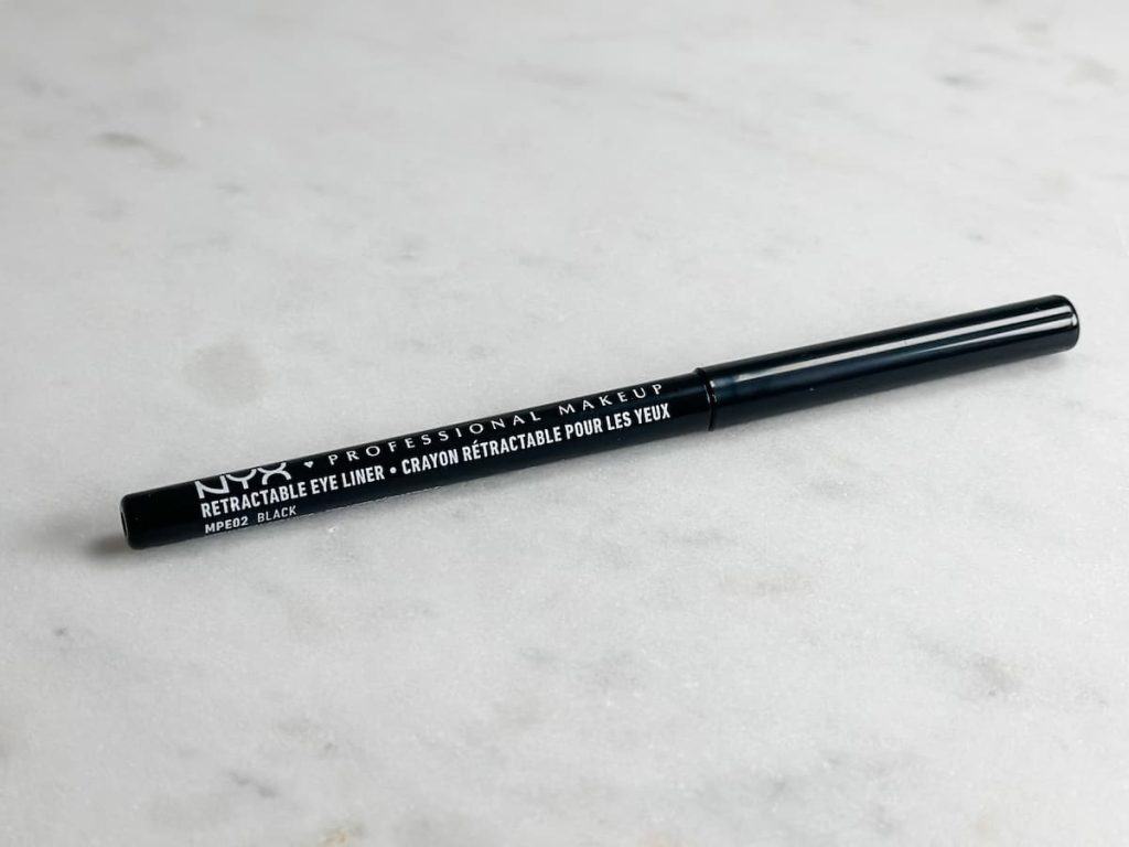 NYX professional makeup black eyeliner on a marble background