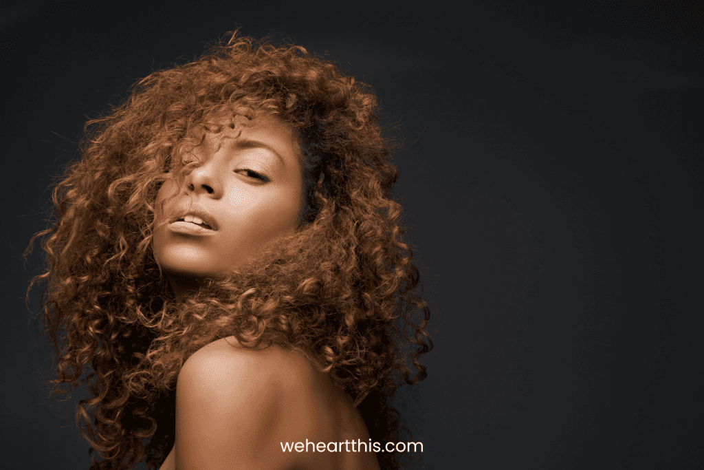 Portrait of a beautiful female fashion model with curly hair