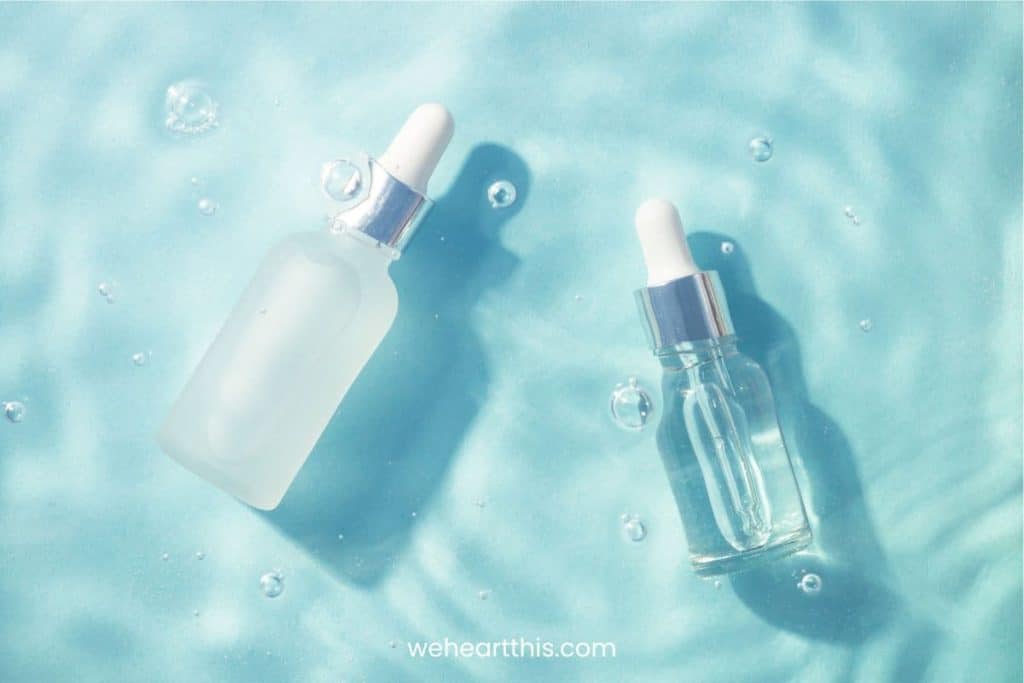 Two serum bottles under water