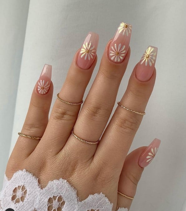 a woman's hand with glossy sheen of these transparent nails boasts a mirror-like effect