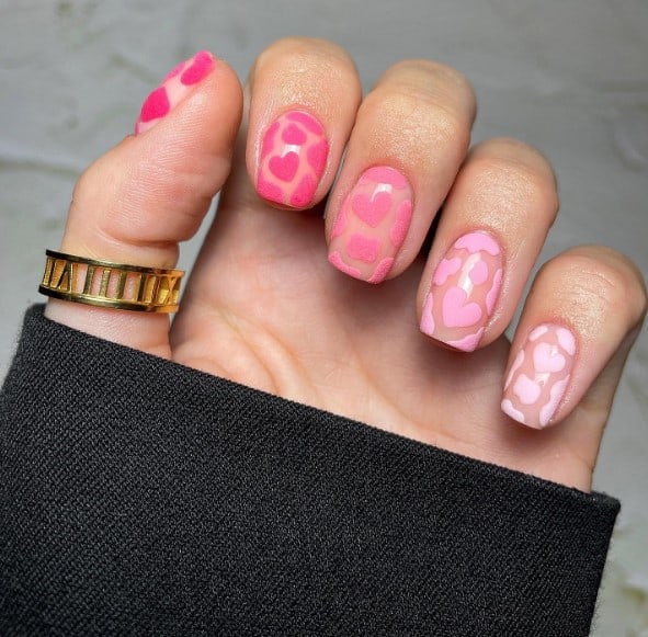 all-over heart pattern on beautiful short square nails