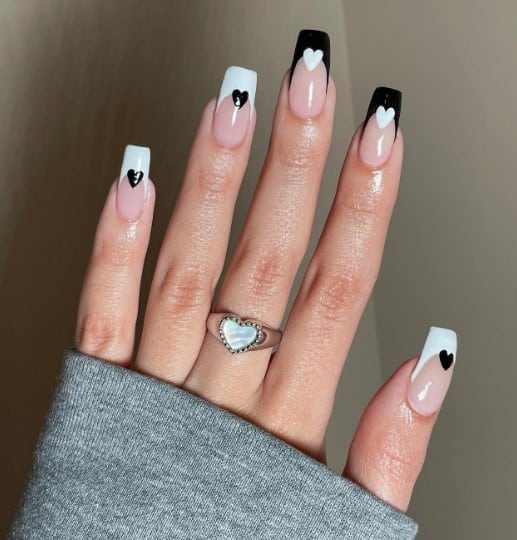 black and white ballerina-shaped heart nails
