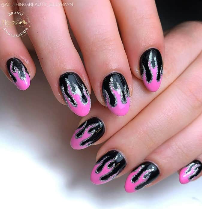bright pink flames lined with sparkly silver polish