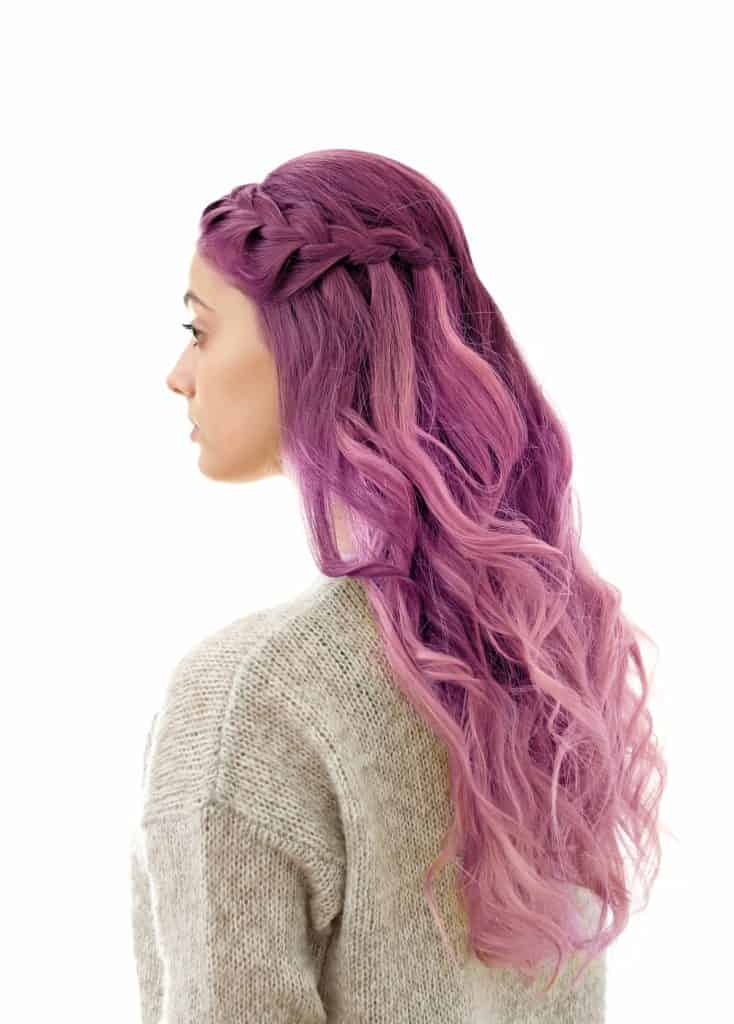 beauty of pastel pink and purple hair where the luscious berry purple gracefully melts into a soft pastel pink