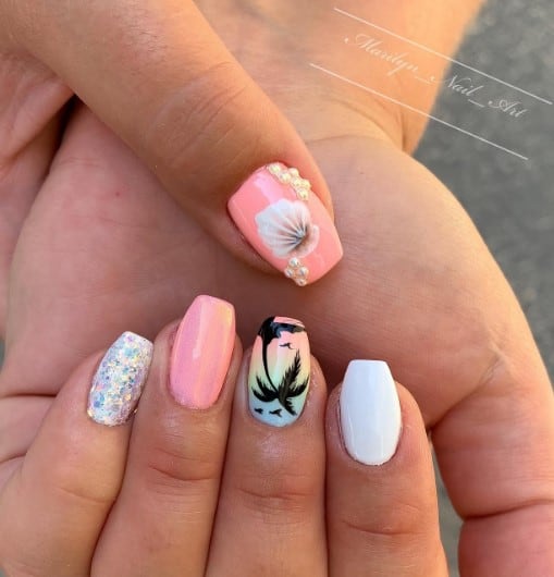  pastel set, palm tree and seashell nail art take center stage, as well as 3D pearls and glitter