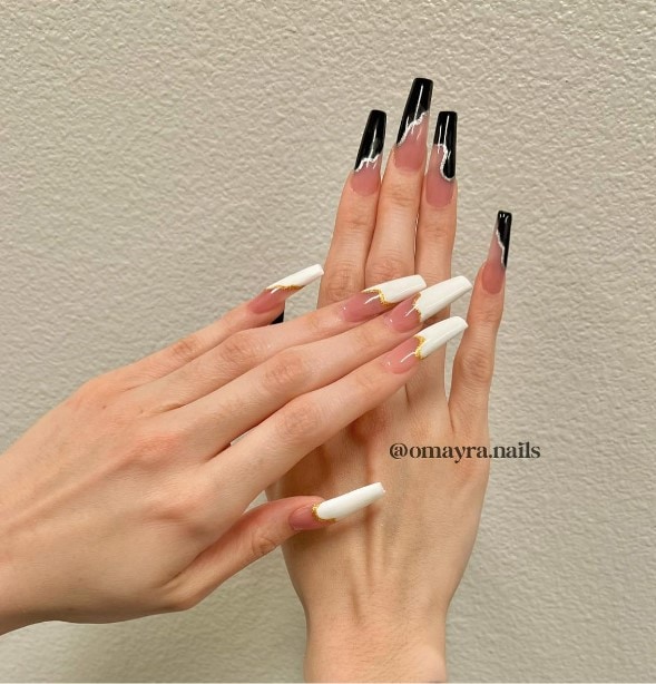 wavy white tips lined with gold and black ones lined with silver