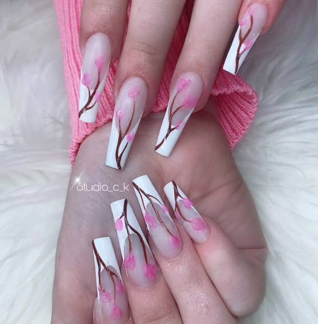 white french tips with with brown branches pink cherry blossoms