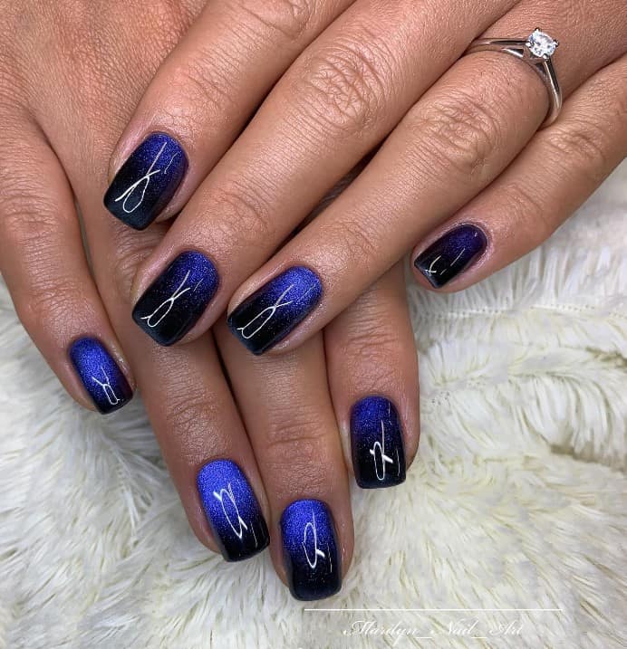 10 Stunning Blue and Black Nail Designs To Try (2024)