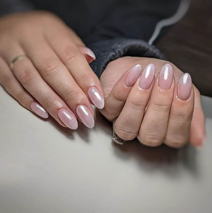 A woman's hands with glazed donut set with this design's ombre mix of two beautiful nude colors