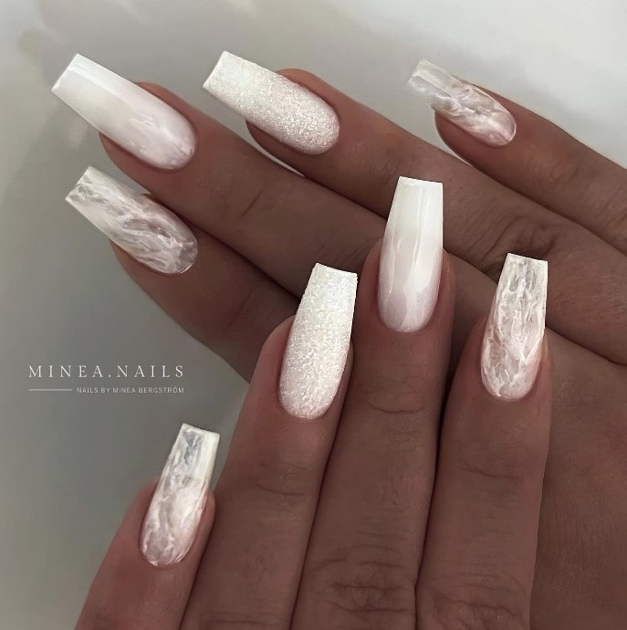 White coffin nails with negative triangle design... - Depop