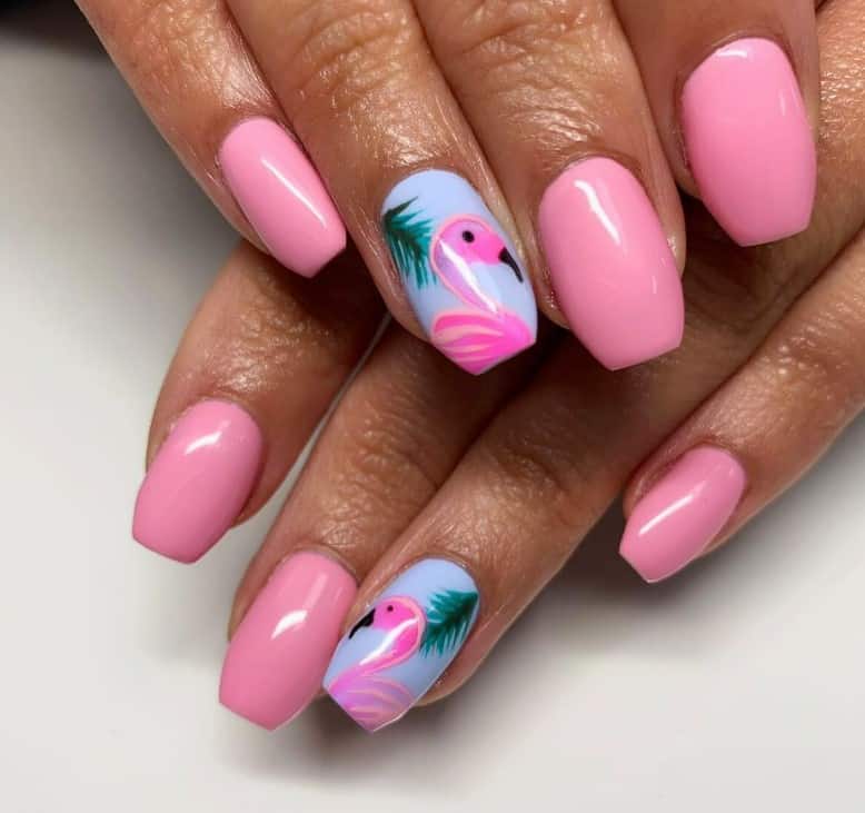 Step into a pink paradise with these short pink ballerina nails, each polished to glossy perfection. Pink flamingo nail art.
