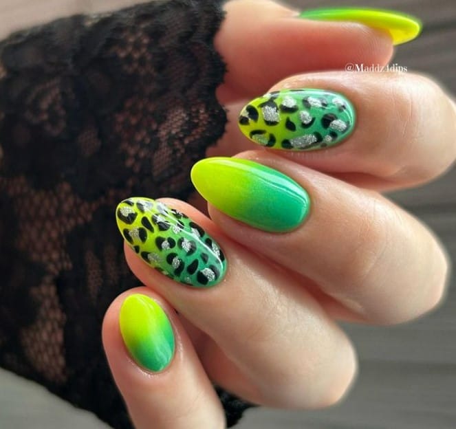 neon dream where bright green fades into a vivid yellow, with select nails showcasing a striking leopard print with glittery silver centers